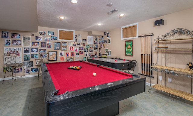 rec room with a textured ceiling and billiards