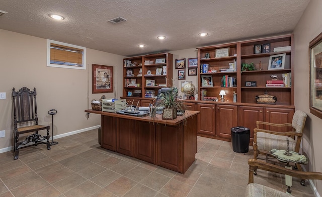 office featuring a textured ceiling