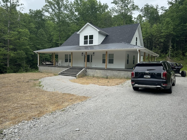 farmhouse inspired home featuring a porch