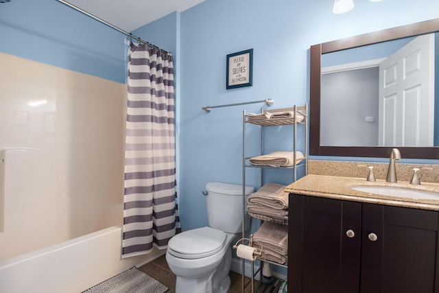 full bath with toilet, shower / tub combo with curtain, and vanity