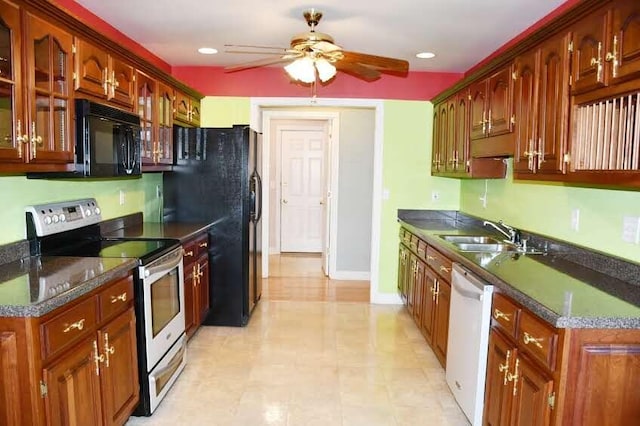 kitchen with black appliances, ceiling fan, and sink