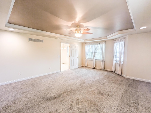 781 E Lexington St, Harrodsburg, KY 40330 - carpeted empty room featuring a raised ceiling, a ceiling fan, and baseboards
