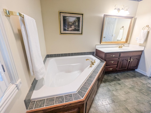 781 E Lexington St, Harrodsburg, KY 40330 - full bath with vanity, a garden tub, and stone finish floors
