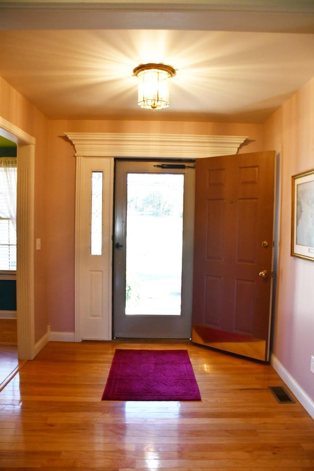 entrance foyer with light wood-type flooring