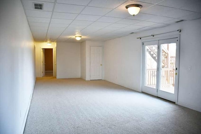 unfurnished room with light carpet