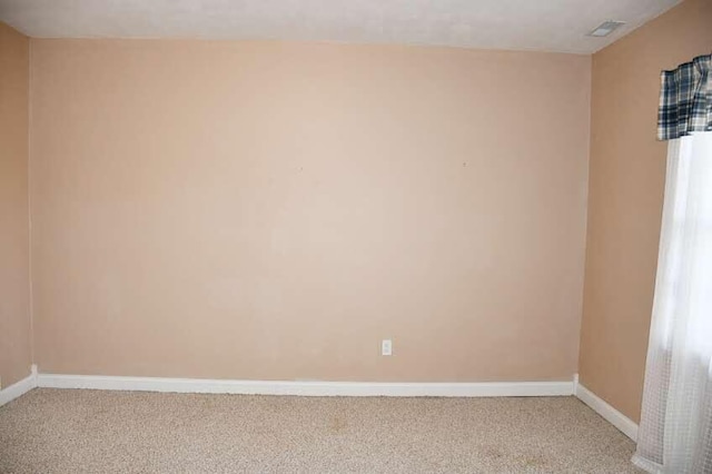 spare room with carpet floors