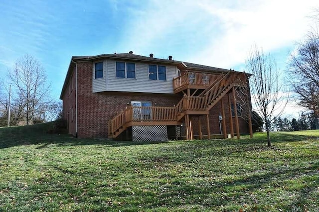 back of property featuring a lawn and a deck