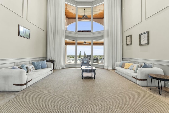 living room with a towering ceiling