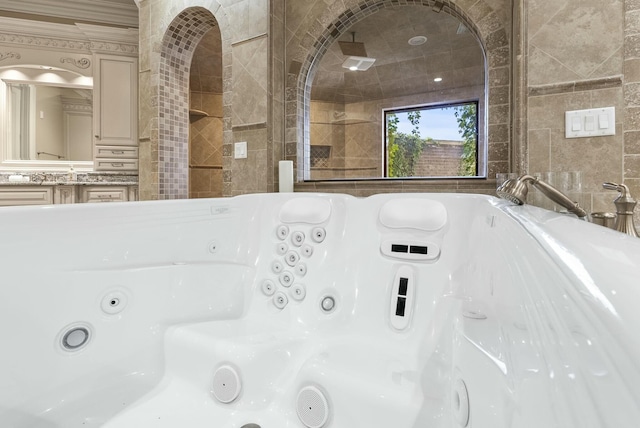 bathroom with tile walls