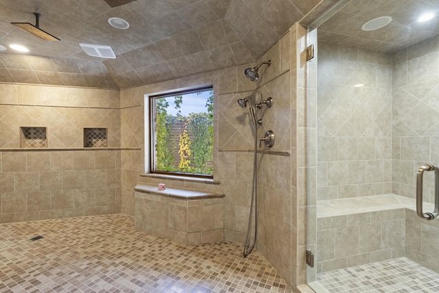 bathroom featuring an enclosed shower