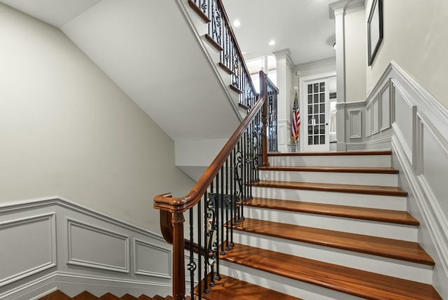 stairs with crown molding