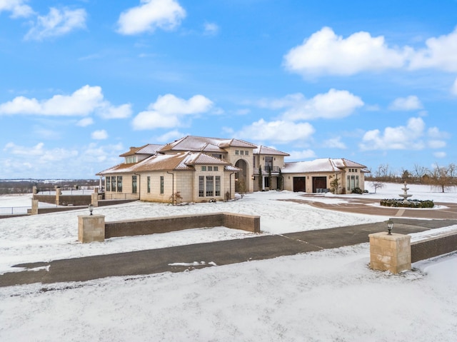 view of snow covered house