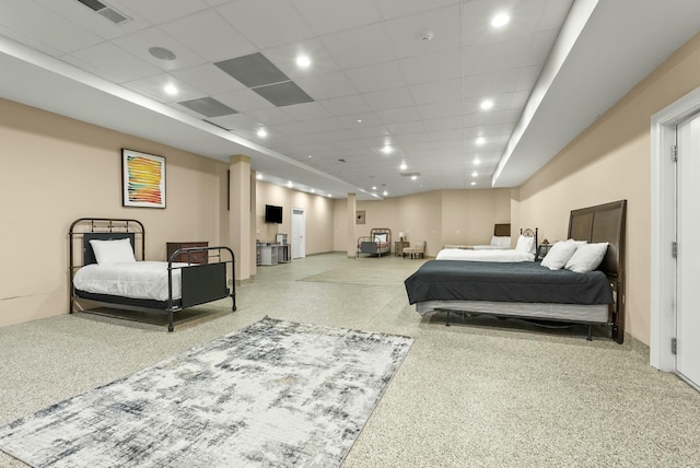 bedroom featuring a drop ceiling