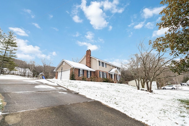 view of snow covered property