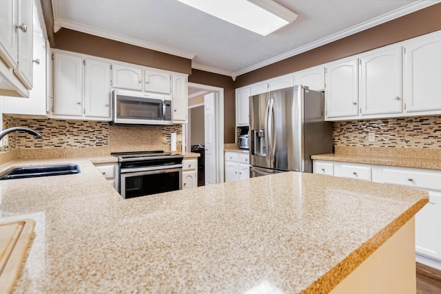 kitchen featuring white cabinets, sink, ornamental molding, appliances with stainless steel finishes, and tasteful backsplash