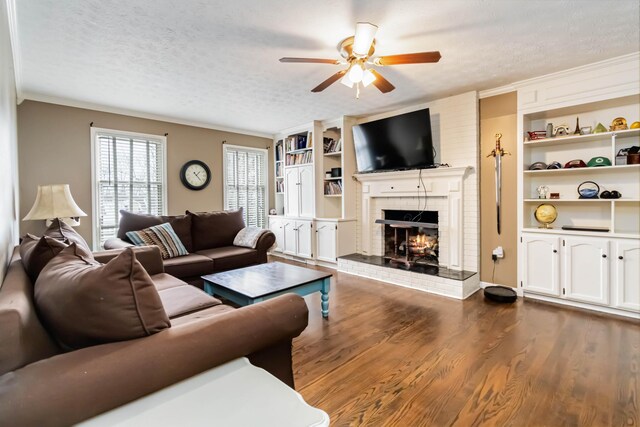 kitchen featuring white cabinets, appliances with stainless steel finishes, decorative light fixtures, and a notable chandelier