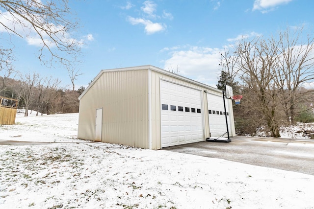 view of snow covered garage