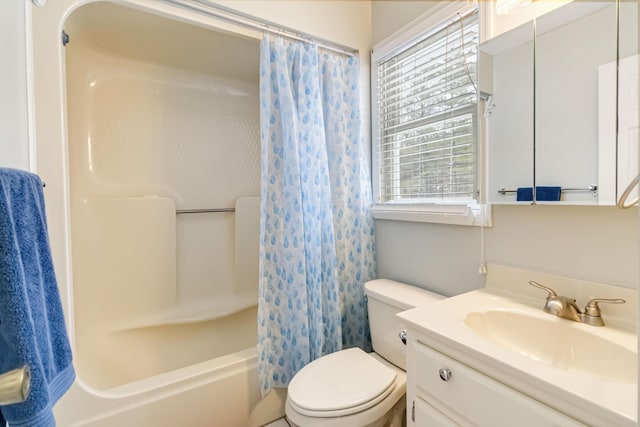 full bathroom featuring vanity, toilet, and shower / bath combo with shower curtain