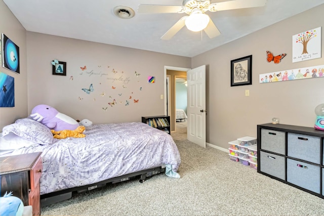 bedroom with ceiling fan and carpet