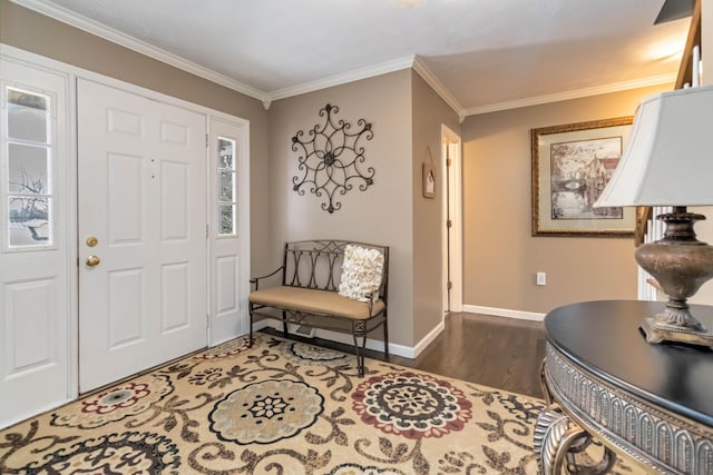 foyer entrance featuring dark hardwood / wood-style floors and ornamental molding