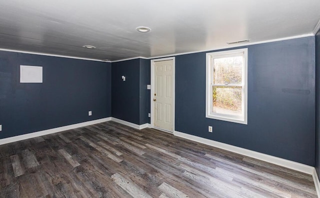 unfurnished room featuring dark hardwood / wood-style floors