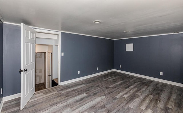 unfurnished bedroom featuring dark wood-type flooring