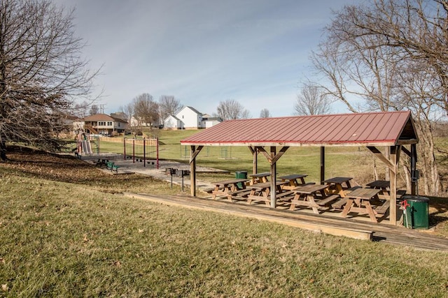 view of property's community featuring a yard