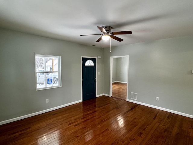 foyer featuring ceiling fan and dark hardwood / wood-style flooring