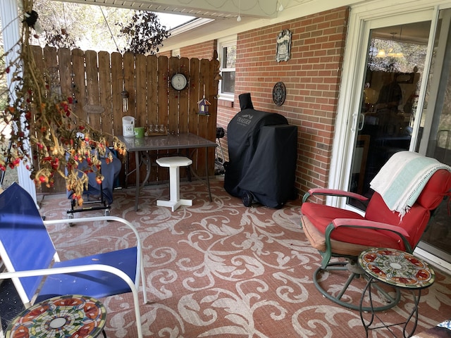 view of patio with a grill