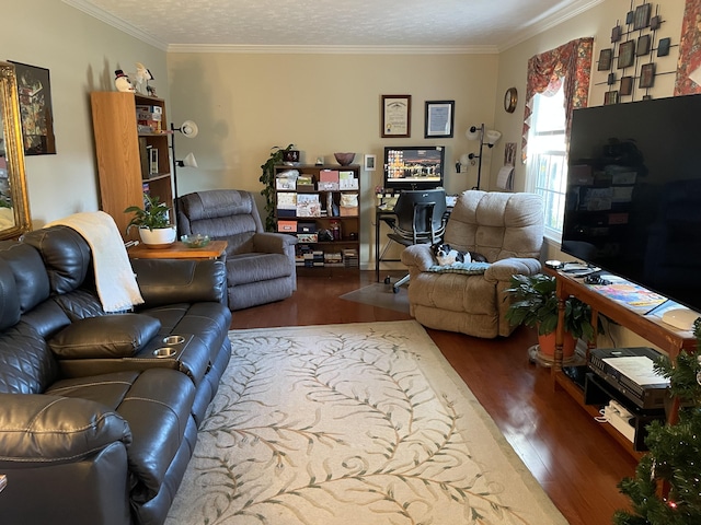 living room with dark wood-type flooring, a textured ceiling, and ornamental molding