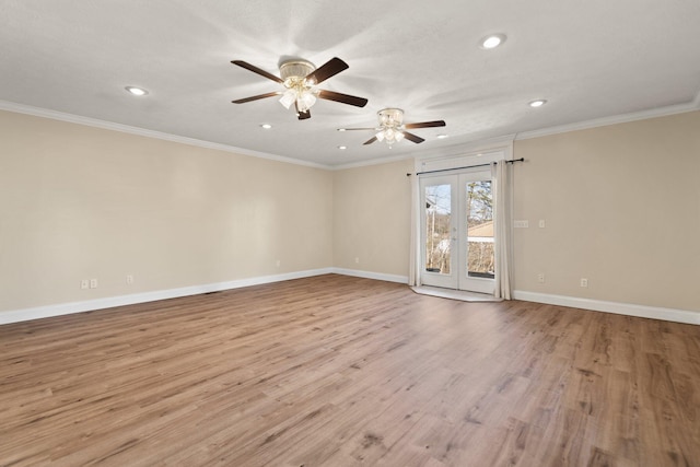 unfurnished room featuring ceiling fan, light hardwood / wood-style floors, ornamental molding, and french doors