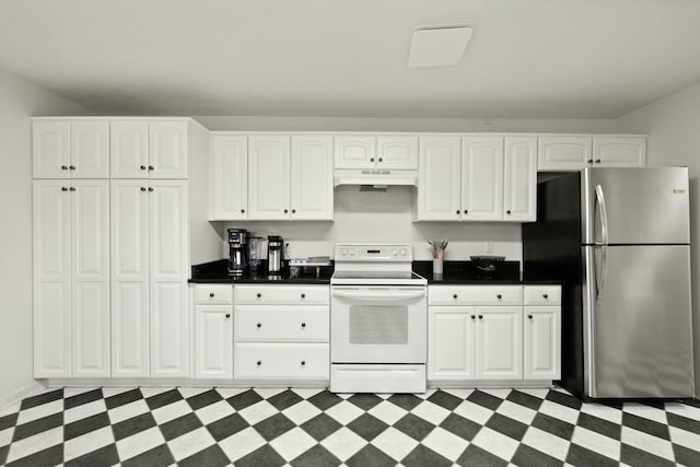 kitchen featuring white cabinetry, stainless steel fridge, and electric stove