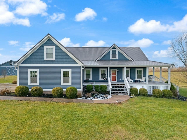 view of front of property featuring covered porch and a front yard