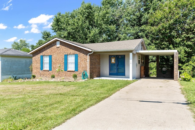 ranch-style home with a carport and a front lawn