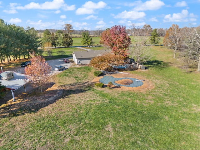 view of yard with a rural view