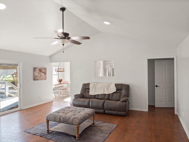 living room featuring ceiling fan, lofted ceiling, and dark hardwood / wood-style floors