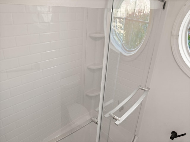 bathroom with an enclosed shower