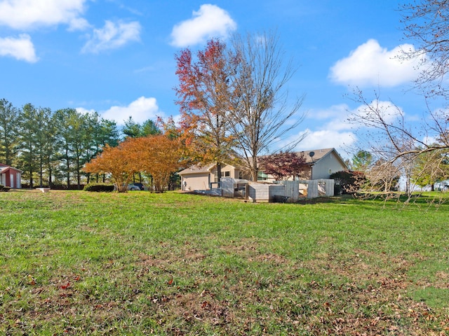 view of yard featuring a garage