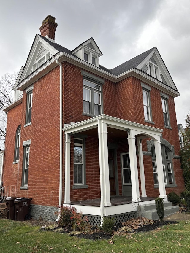 view of property exterior with a porch