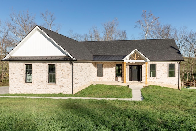 view of front of property with a front lawn