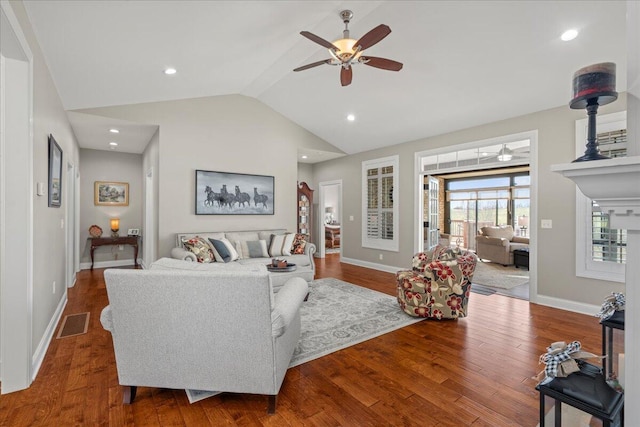 living room featuring wood-type flooring, ceiling fan, and lofted ceiling