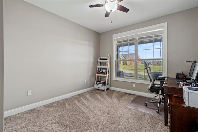 office area with carpet flooring and ceiling fan