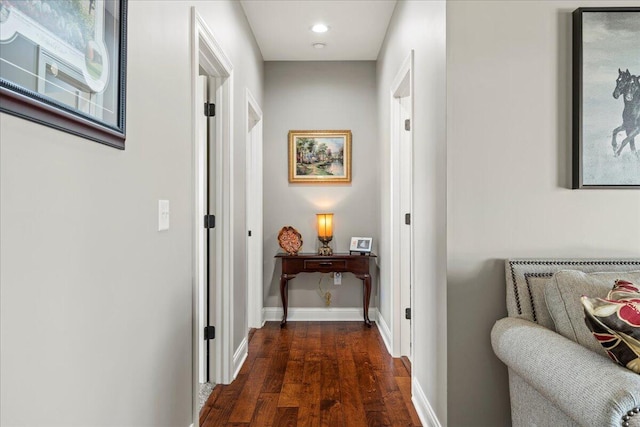 hallway featuring dark hardwood / wood-style flooring