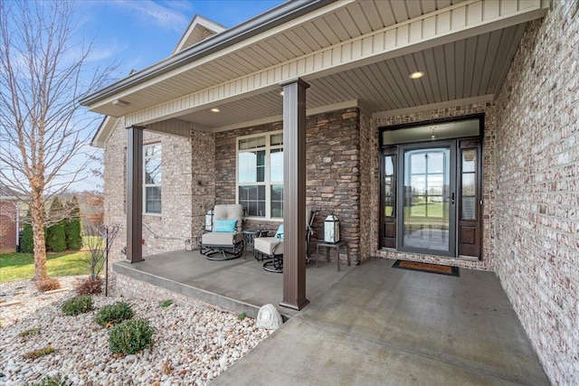 entrance to property featuring a porch