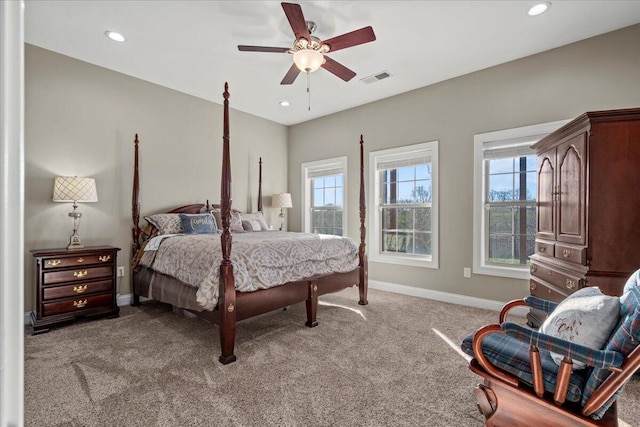 bedroom featuring ceiling fan and light colored carpet