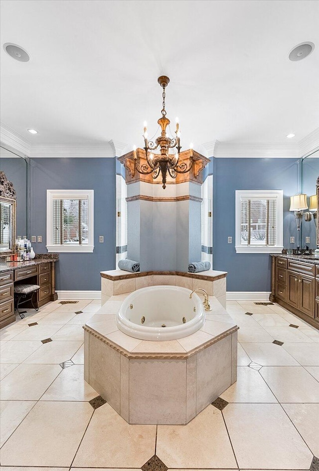 bathroom featuring crown molding, tile patterned flooring, vanity, and a chandelier