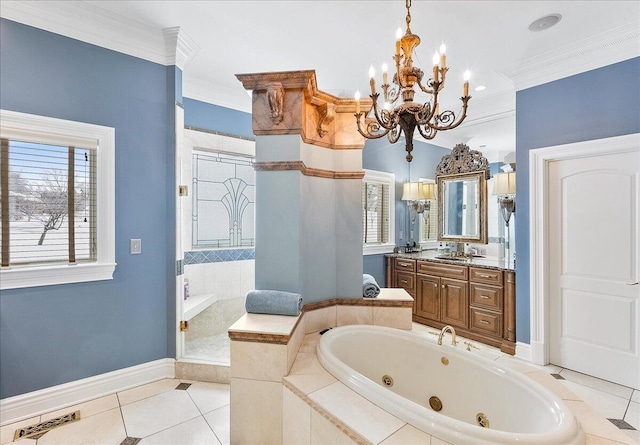 bathroom with tile patterned floors, ornamental molding, vanity, tiled tub, and a notable chandelier