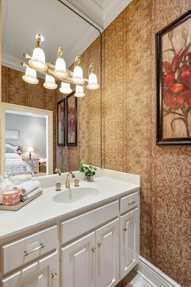 bathroom featuring vanity and ornamental molding