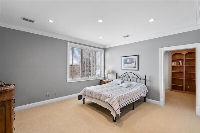 carpeted bedroom featuring crown molding