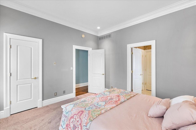 bedroom featuring light colored carpet and ornamental molding